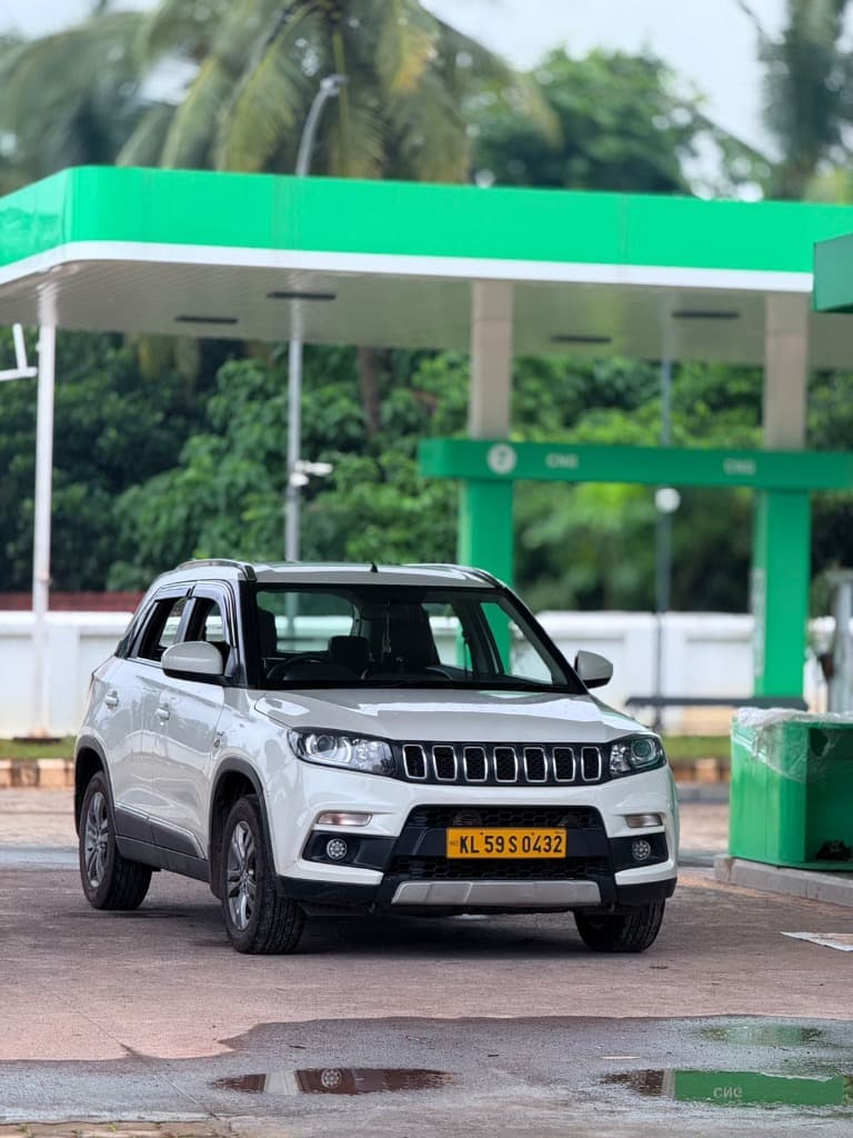MR.TAXI white Maruti Vitara Brezza SUV